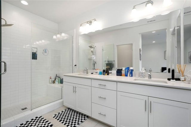 101 Red Brick Dr Unit 5, Simi Valley, CA 93065 - full bathroom with double vanity, a stall shower, tile patterned floors, and recessed lighting