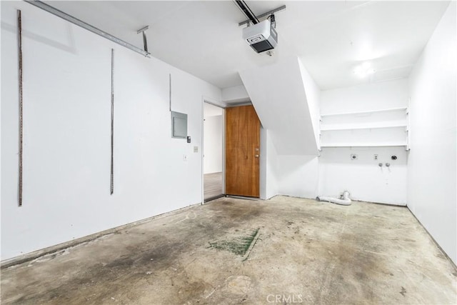 10710 El Camino Real Unit 14, Atascadero, CA 93422 - garage with a garage door opener and electric panel