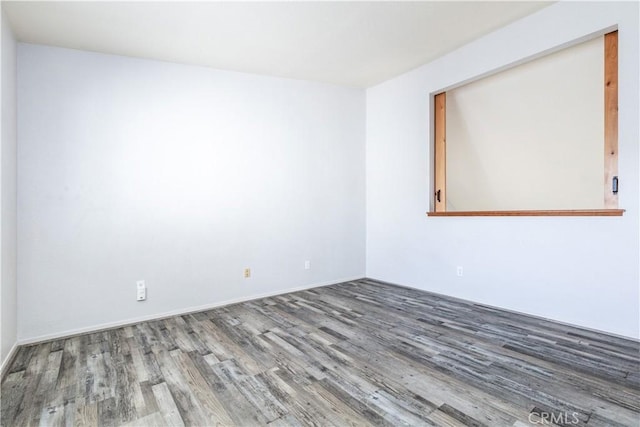 10710 El Camino Real Unit 14, Atascadero, CA 93422 - empty room featuring wood finished floors and baseboards