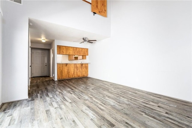 10710 El Camino Real Unit 14, Atascadero, CA 93422 - unfurnished living room with wood finished floors and a ceiling fan