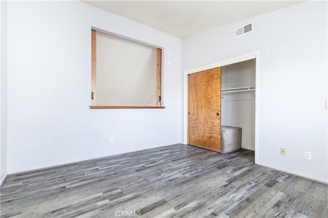 10710 El Camino Real Unit 14, Atascadero, CA 93422 - unfurnished bedroom featuring wood finished floors and a closet