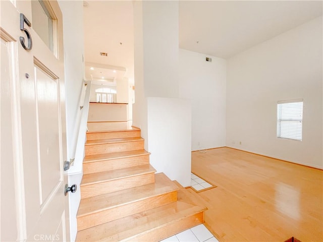 1628 E Palm Ave Unit 5, El Segundo, CA 90245 - staircase with plenty of natural light and wood finished floors