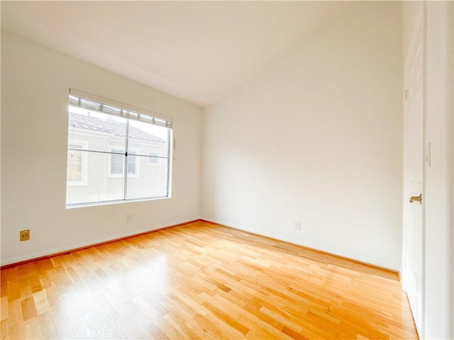 1628 E Palm Ave Unit 5, El Segundo, CA 90245 - spare room with light wood-type flooring and lofted ceiling