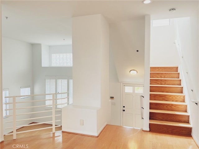 1628 E Palm Ave Unit 5, El Segundo, CA 90245 - entrance foyer featuring wood finished floors, stairs, and recessed lighting