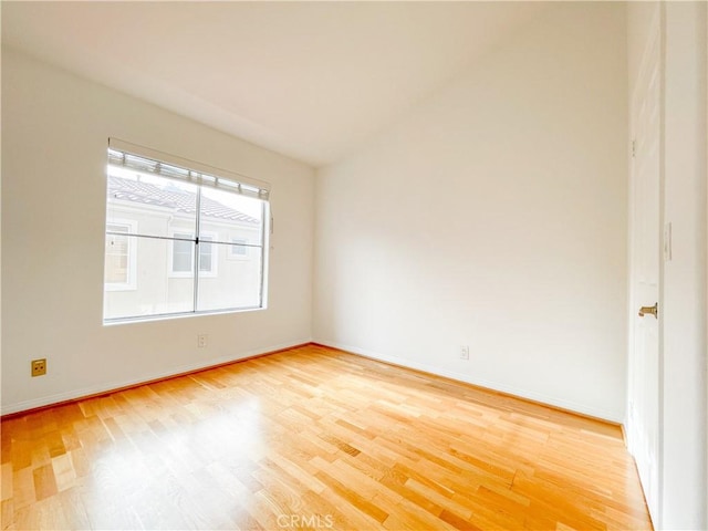 1628 E Palm Ave Unit 5, El Segundo, CA 90245 - spare room featuring light wood-style flooring and lofted ceiling