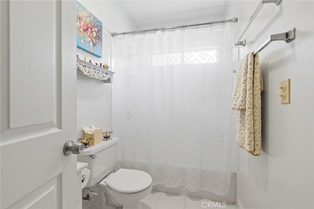 35 Columbia St, Pasadena, CA 91105 - bathroom featuring shower / bath combo with shower curtain and tile patterned floors