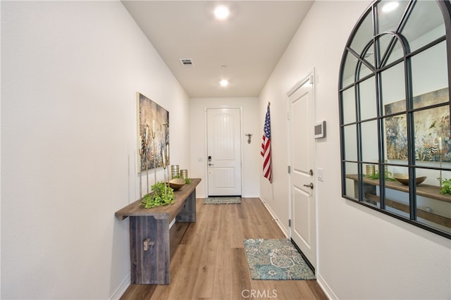 33084 Toledo Bend Ct, Winchester, CA 92596 - doorway with wood finished floors and baseboards