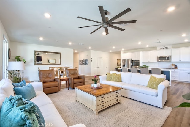 33084 Toledo Bend Ct, Winchester, CA 92596 - living area with a ceiling fan, recessed lighting, and light wood finished floors