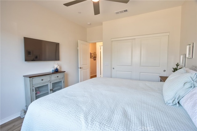 33084 Toledo Bend Ct, Winchester, CA 92596 - bedroom featuring a closet, wood finished floors, and ceiling fan