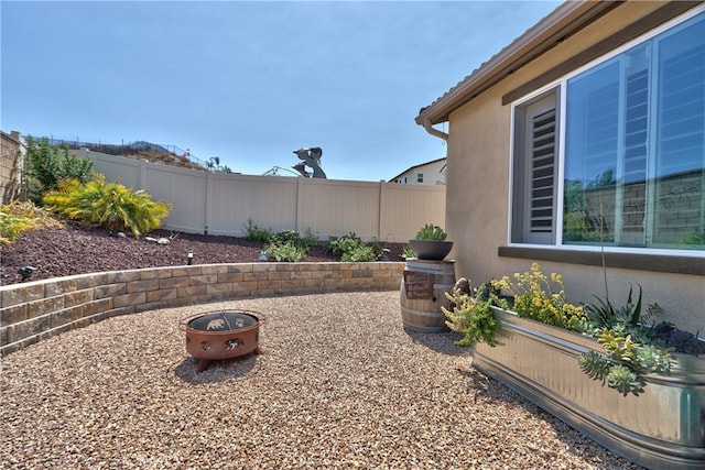 33084 Toledo Bend Ct, Winchester, CA 92596 - view of yard with an outdoor fire pit