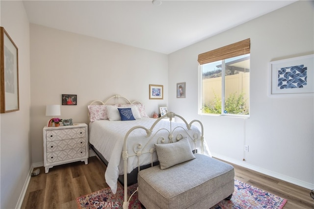 33084 Toledo Bend Ct, Winchester, CA 92596 - bedroom featuring wood finished floors and baseboards
