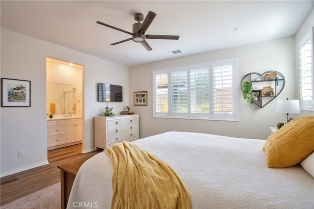 33084 Toledo Bend Ct, Winchester, CA 92596 - bedroom featuring wood finished floors, connected bathroom, and ceiling fan