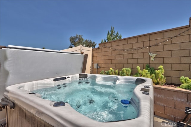 33084 Toledo Bend Ct, Winchester, CA 92596 - view of swimming pool with a hot tub