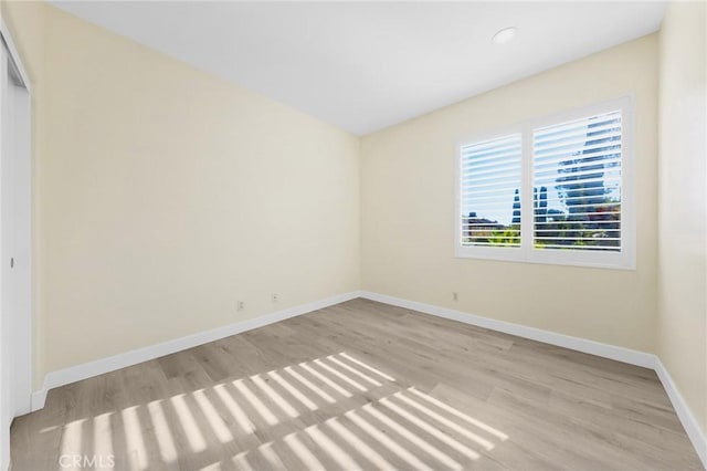 18680 Vantage Pointe Dr, Rowland Heights, CA 91748 - unfurnished bedroom featuring light wood-style flooring, a closet, and recessed lighting