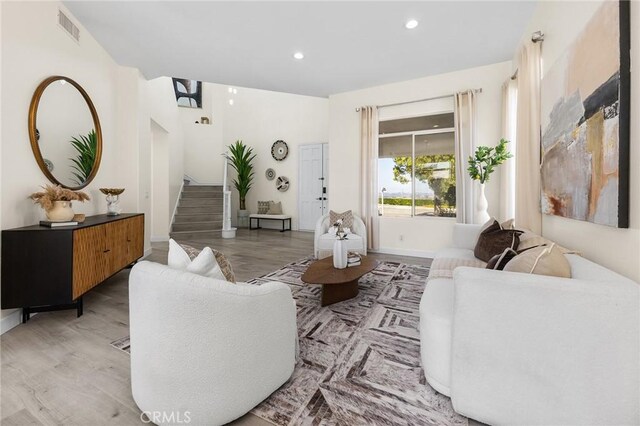 18680 Vantage Pointe Dr, Rowland Heights, CA 91748 - living area featuring stairway, light wood-style flooring, and recessed lighting