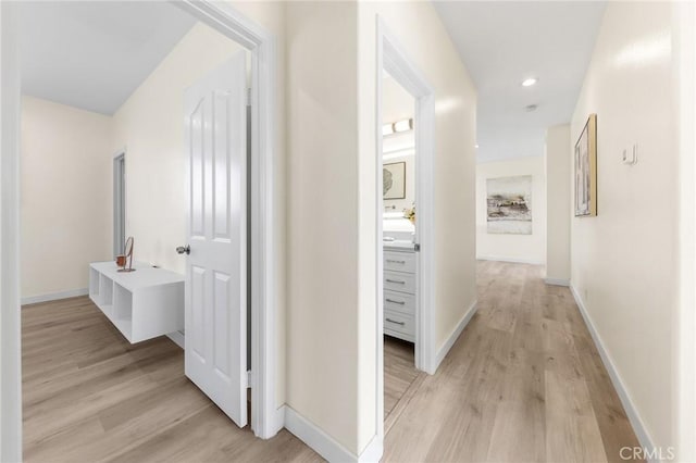 18680 Vantage Pointe Dr, Rowland Heights, CA 91748 - hallway with light wood finished floors and recessed lighting