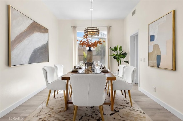 18680 Vantage Pointe Dr, Rowland Heights, CA 91748 - dining room with a chandelier and light wood-type flooring
