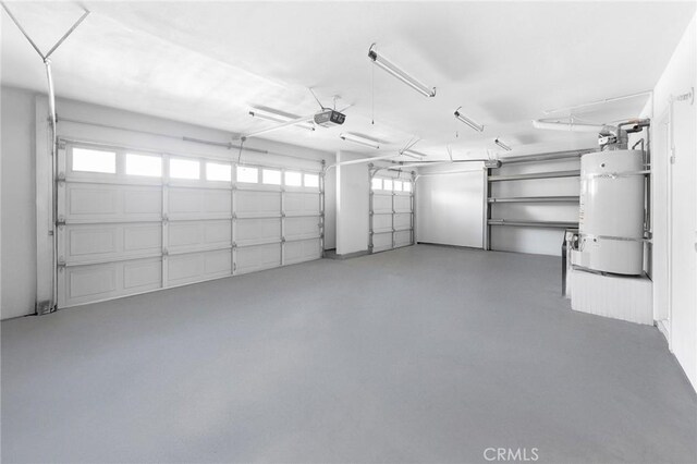 18680 Vantage Pointe Dr, Rowland Heights, CA 91748 - garage featuring secured water heater and a garage door opener