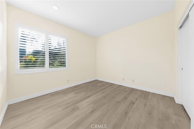 18680 Vantage Pointe Dr, Rowland Heights, CA 91748 - unfurnished bedroom featuring light wood finished floors, a closet, and recessed lighting