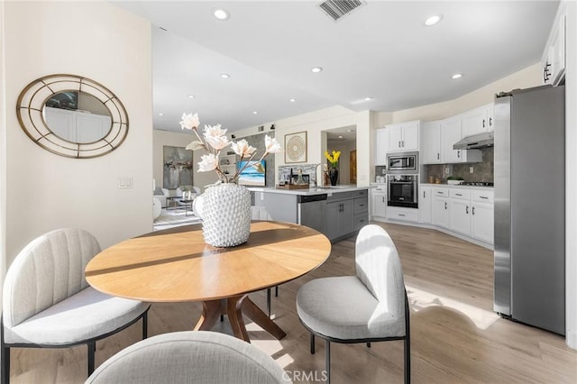 18680 Vantage Pointe Dr, Rowland Heights, CA 91748 - dining space featuring light wood-style floors and recessed lighting