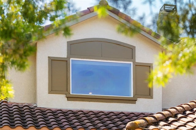 18680 Vantage Pointe Dr, Rowland Heights, CA 91748 - view of side of home featuring stucco siding and a tile roof