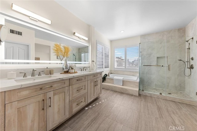 18680 Vantage Pointe Dr, Rowland Heights, CA 91748 - bathroom with a garden tub, double vanity, and a stall shower