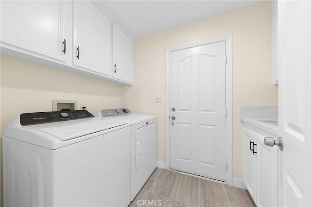 18680 Vantage Pointe Dr, Rowland Heights, CA 91748 - laundry room featuring washer and dryer, cabinet space, and light wood finished floors