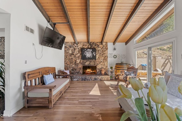 2100 Valley Meadow Dr, Oak View, CA 93022 - living area featuring wooden ceiling, a stone fireplace, and wood finished floors
