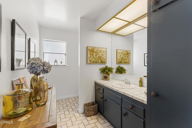 2100 Valley Meadow Dr, Oak View, CA 93022 - bathroom with vanity and brick patterned floors