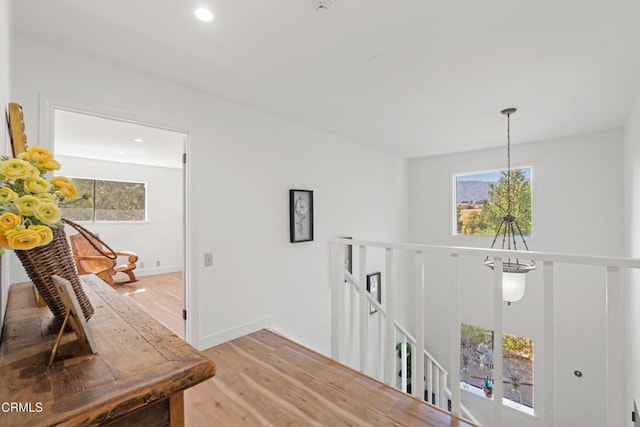 2100 Valley Meadow Dr, Oak View, CA 93022 - hallway featuring light wood-type flooring, an upstairs landing, a chandelier, and recessed lighting