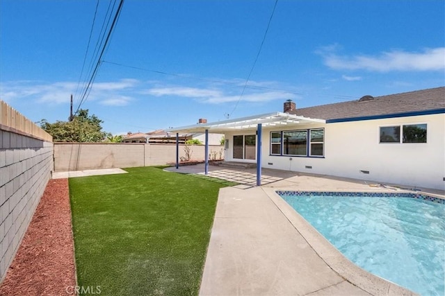 11251 Bowles Ave, Garden Grove, CA 92841 - back of property featuring a fenced backyard, a patio, and stucco siding