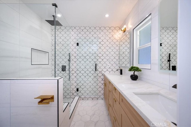 11251 Bowles Ave, Garden Grove, CA 92841 - full bathroom with tile walls, double vanity, tiled shower, tile patterned flooring, and recessed lighting