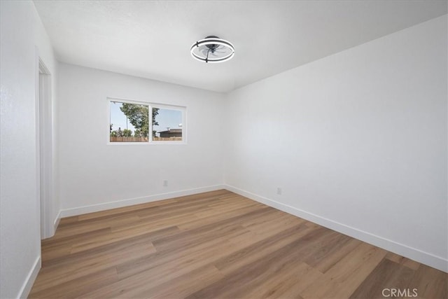11251 Bowles Ave, Garden Grove, CA 92841 - spare room with light wood-style floors and baseboards