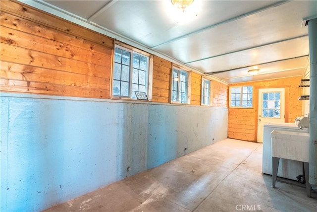 31954 Pine Cone Dr, Running Springs, CA 92382 - interior space with concrete floors, wood walls, and washer / clothes dryer