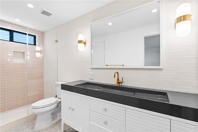 1817 W Bay Ave Unit A, Newport Beach, CA 92663 - full bathroom with vanity, recessed lighting, a tile shower, and tile patterned flooring