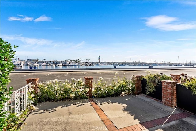 1817 W Bay Ave Unit A, Newport Beach, CA 92663 - view of patio with a water view