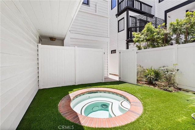 1817 W Bay Ave Unit A, Newport Beach, CA 92663 - view of yard with an in-ground hot tub and a balcony