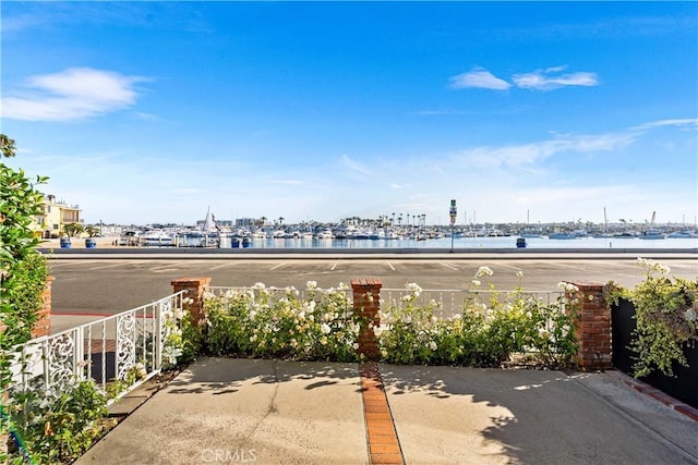1817 W Bay Ave Unit A, Newport Beach, CA 92663 - view of patio with a water view