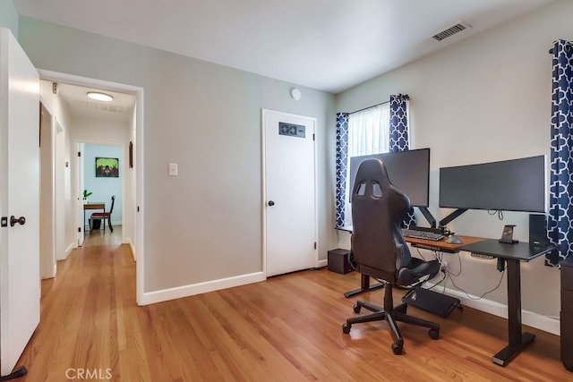 12826 Bombardier Ave, Norwalk, CA 90650 - office featuring light wood-type flooring and baseboards