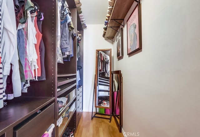 12826 Bombardier Ave, Norwalk, CA 90650 - spacious closet with wood finished floors