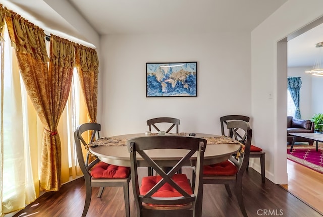 12826 Bombardier Ave, Norwalk, CA 90650 - dining room with dark wood-type flooring