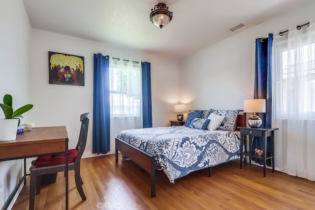 12826 Bombardier Ave, Norwalk, CA 90650 - bedroom with wood finished floors