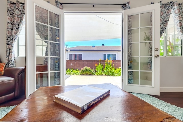 12826 Bombardier Ave, Norwalk, CA 90650 - doorway with wood finished floors and baseboards