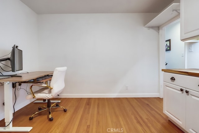 12826 Bombardier Ave, Norwalk, CA 90650 - home office featuring light wood finished floors
