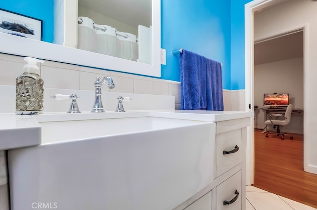 12826 Bombardier Ave, Norwalk, CA 90650 - bathroom featuring vanity and wood finished floors
