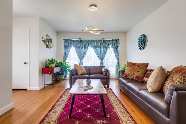12826 Bombardier Ave, Norwalk, CA 90650 - living area with wood finished floors and baseboards