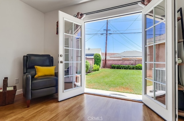 12826 Bombardier Ave, Norwalk, CA 90650 - doorway to outside with wood finished floors