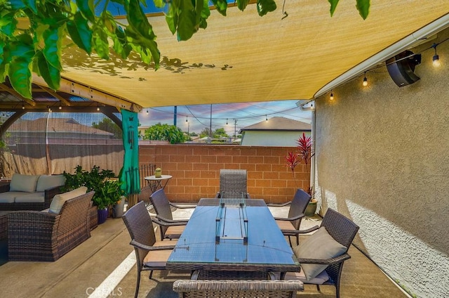 12826 Bombardier Ave, Norwalk, CA 90650 - view of patio with outdoor dining space and an outdoor living space
