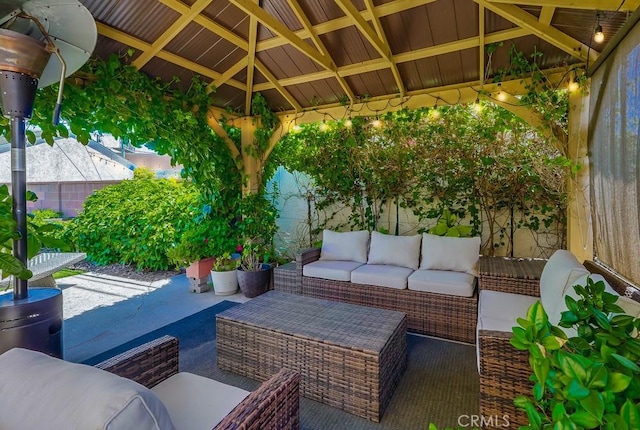 12826 Bombardier Ave, Norwalk, CA 90650 - fenced backyard featuring outdoor lounge area, a patio area, and a gazebo