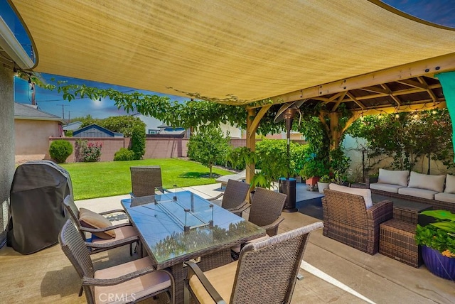 12826 Bombardier Ave, Norwalk, CA 90650 - fenced backyard featuring outdoor dining space, a patio, an outdoor living space, and grilling area